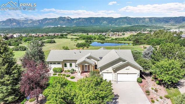 14750 Pristine Drive Colorado Springs, CO House Active - Photo 1 of 48. Opens carousel modal