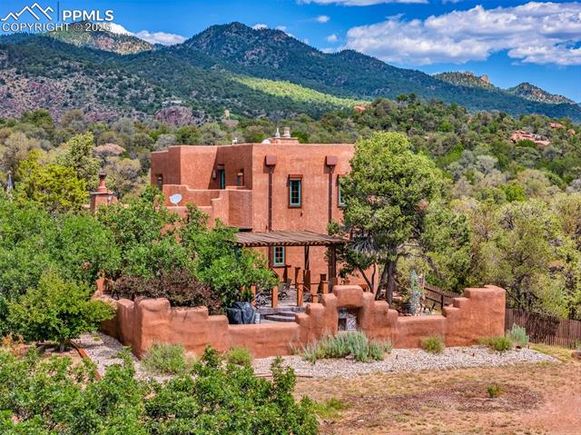 15660 Rancho Pavo Drive Colorado Springs, CO House Active - Photo 1 of 49. Opens carousel modal