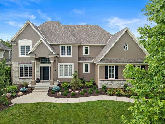 9700 W 144th Street Overland Park, KS House Sold - Photo 1 of 52. Opens carousel modal