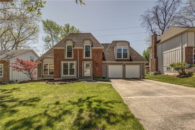 12605 W 70th Street Shawnee, KS House Contingent - Photo 1 of 22. Opens carousel modal