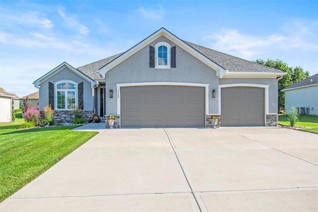 1132 SW Whispering Willow Way Lee's Summit, MO House Active - Photo 1 of 35. Opens carousel modal