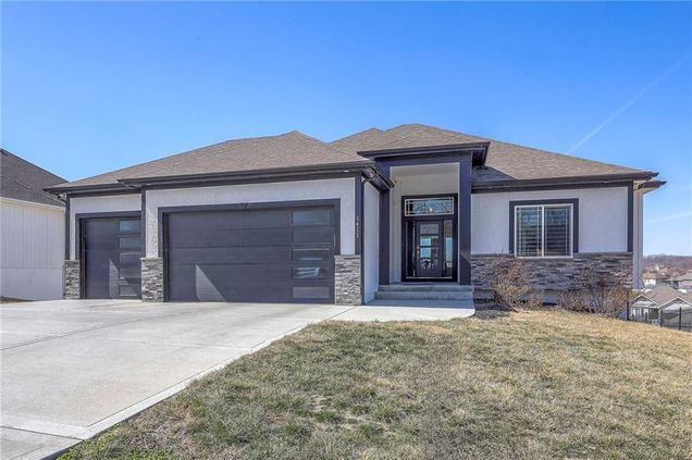 1411 Maple Drive Grain Valley, MO House Active - Photo 1 of 56. Opens carousel modal