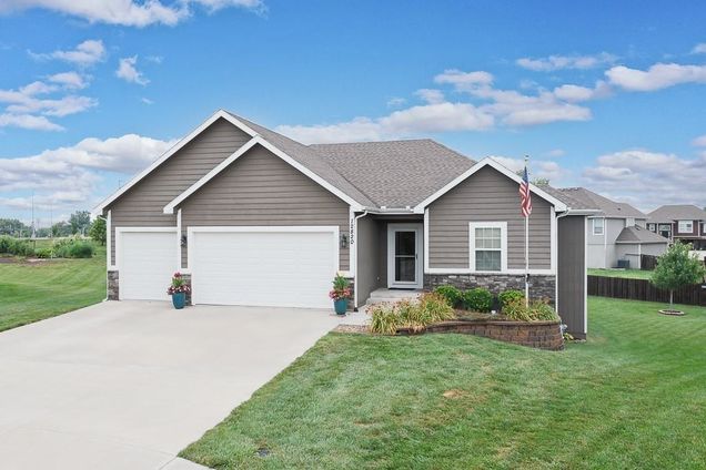 12820 Spring Avenue Kansas City, KS House Active - Photo 1 of 32. Opens carousel modal