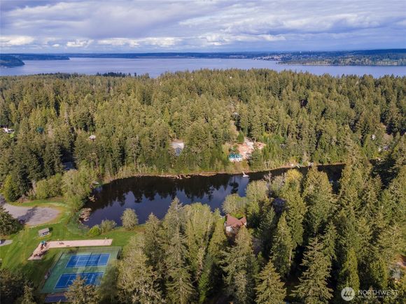 10915 Mathews Way Anderson Island, WA Plot of land Active - Photo 1 of 10. Opens carousel modal