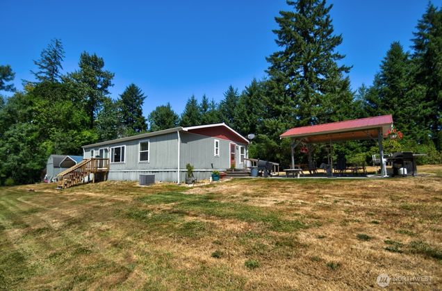 930 Tipsoo Loop N Rainier, WA House Active - Photo 1 of 34. Opens carousel modal