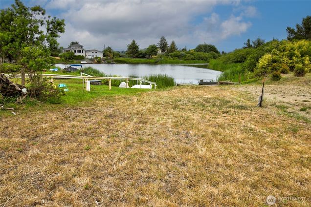 399 N Razor Clam Drive SW Ocean Shores, WA House Active - Photo 1 of 32. Opens carousel modal