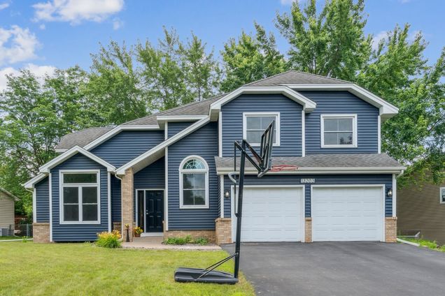 13203 Zion Street NW Coon Rapids, MN House Coming Soon - Photo 1 of 34. Opens carousel modal