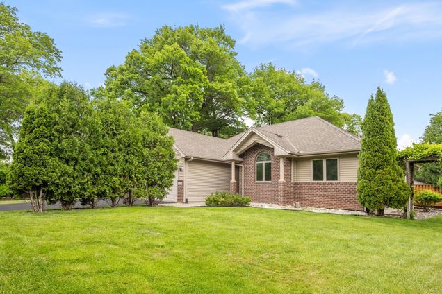 11228 W River Road Champlin, MN House Active - Photo 1 of 32. Opens carousel modal