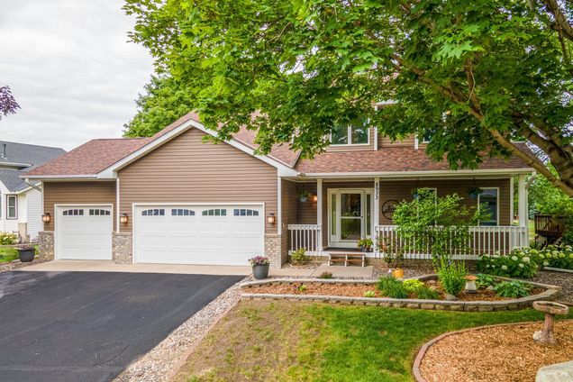 8933 Trinity Gardens N Brooklyn Park, MN House Active - Photo 1 of 74. Opens carousel modal