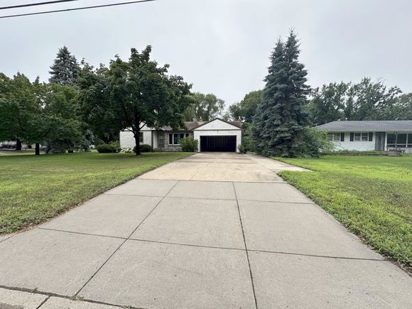 1390 Onondaga Street NE Fridley, MN House Active - Photo 1 of 10. Opens carousel modal