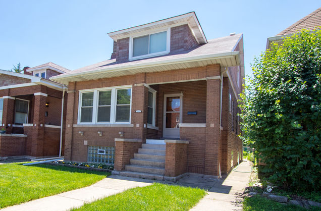 5543 W Wilson Avenue Chicago, IL House Sold - Photo 1 of 39. Opens carousel modal