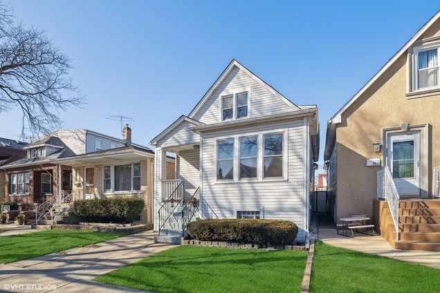 5836 W Leland Avenue Chicago, IL House Sold - Photo 1 of 22. Opens carousel modal