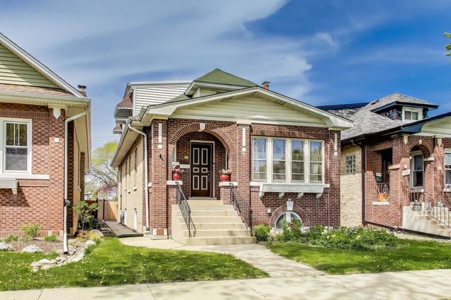 4424 N Lamon Avenue Chicago, IL House Sold - Photo 1 of 33. Opens carousel modal