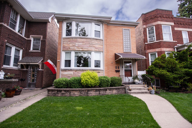 4938 N Monitor Avenue Unit 1 Chicago, IL House Active - Photo 1 of 7. Opens carousel modal