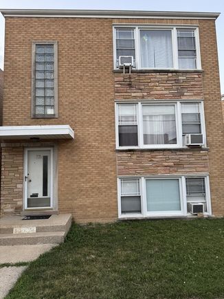 5910 W Higgins Avenue Unit 2 Chicago, IL House Active - Photo 1 of 15. Opens carousel modal