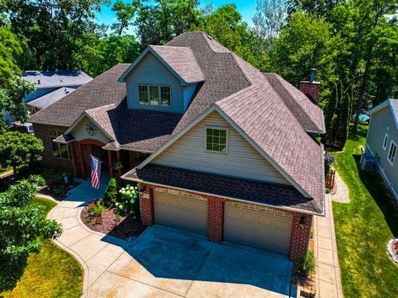 1658 Sunnyslope Drive Crown Point, IN House Active - Photo 1 of 56. Opens carousel modal