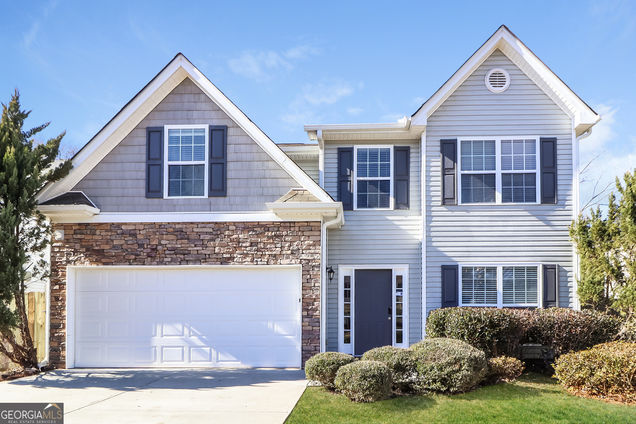 1266 Key Manor Lane Lawrenceville, GA House Active - Photo 1 of 17. Opens carousel modal