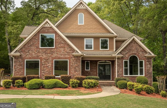 1621 Alcovy Ridge Crossing Loganville, GA House Active - Photo 1 of 61. Opens carousel modal