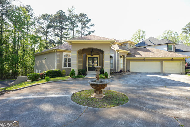 1010 Forest Overlook Drive SW Atlanta, GA House Active - Photo 1 of 41. Opens carousel modal