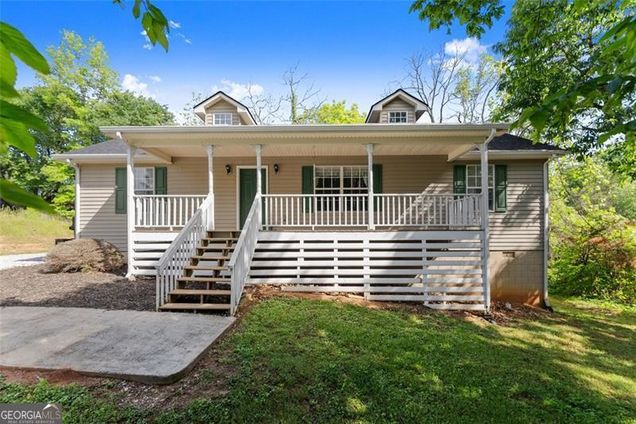 5523 Green Circle Clermont, GA House Active - Photo 1 of 31. Opens carousel modal