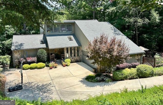 4221 Burns Heritage Trail NE Roswell, GA House Active - Photo 1 of 52. Opens carousel modal