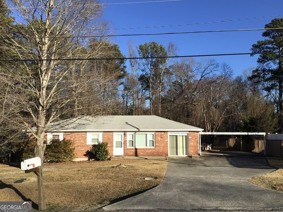 6776 Tralee Drive Lithia Springs, GA House Active - Photo 1 of 11. Opens carousel modal