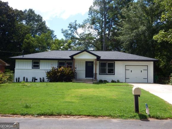 1340 Juneau Court Tucker, GA House Active - Photo 1 of 26. Opens carousel modal