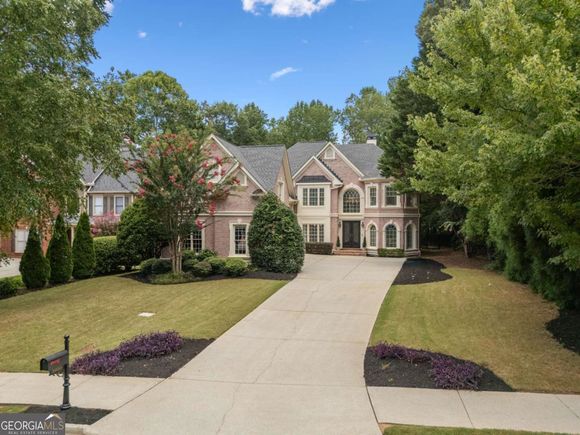 1035 Autumn Close Milton, GA House Active - Photo 1 of 71. Opens carousel modal