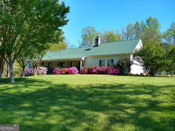 7955 Nicholson Road Cumming, GA House Active - Photo 1 of 92. Opens carousel modal