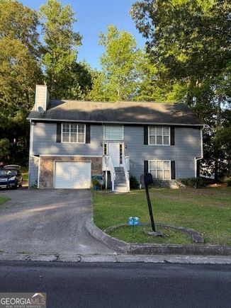 1015 Sly Fox Court Stone Mountain, GA House Active - Photo 1 of 4. Opens carousel modal