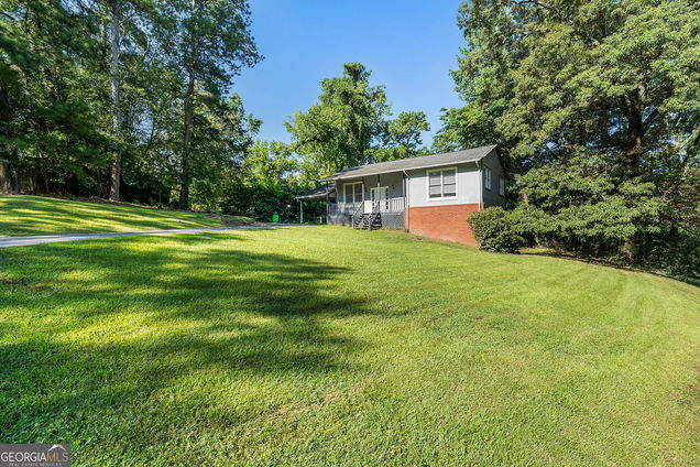 5056 Fairmont Road SE Smyrna, GA House Active - Photo 1 of 25. Opens carousel modal