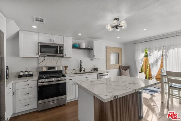 9800 Vesper Avenue Unit 110 Panorama City (los Angeles), CA Townhouse Sold - Photo 1 of 35. Opens carousel modal