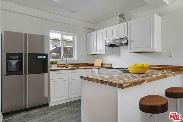 8821 Reading Avenue Los Angeles, CA Condo Active - Photo 1 of 10. Opens carousel modal