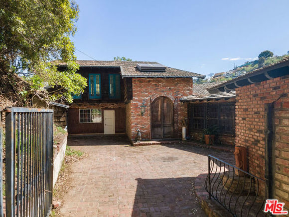 7319 Woodrow Wilson Drive Los Angeles, CA House Sold - Photo 1 of 2. Opens carousel modal