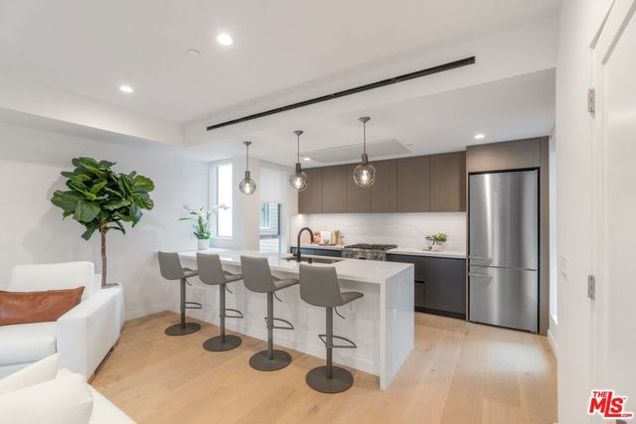 7156 Willoughby Avenue Los Angeles, CA House Active - Photo 1 of 36. Opens carousel modal