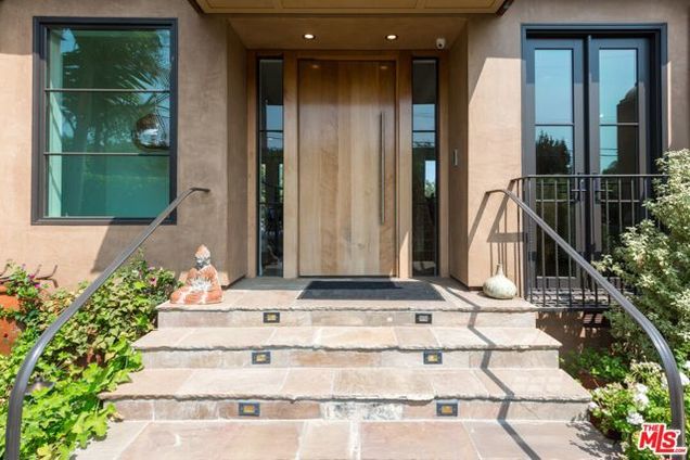 230 N Barrington Avenue Los Angeles, CA House Pending - Photo 1 of 51. Opens carousel modal