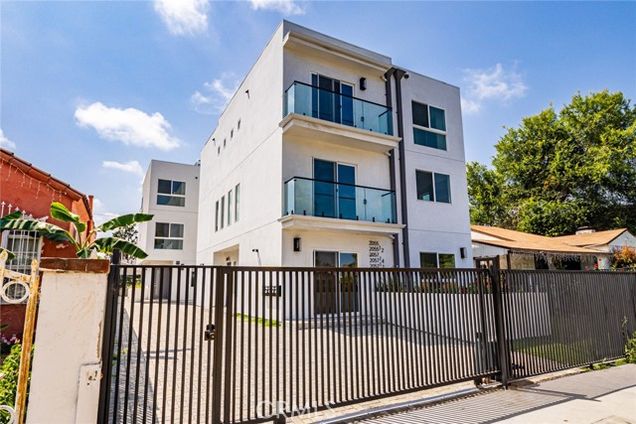2055 Garth Avenue Unit 1/2 Los Angeles, CA Townhouse Active - Photo 1 of 60. Opens carousel modal