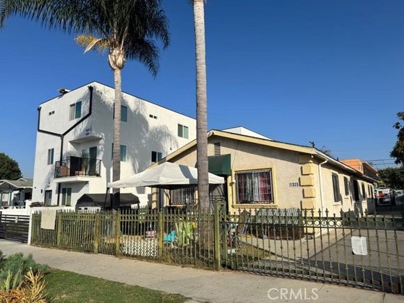 1323 W 58th Street Los Angeles, CA Multifamily Sold - Photo 1 of 2. Opens carousel modal