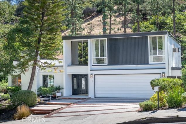 16990 Escalon Drive Encino (los Angeles), CA House Active - Photo 1 of 28. Opens carousel modal