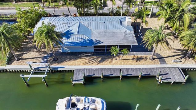 834 Jungle Queen Way LONGBOAT KEY, FL House Active - Photo 1 of 28. Opens carousel modal