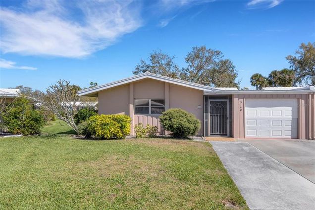 3140 Village Green Drive Unit 1119 SARASOTA, FL House Active - Photo 1 of 46. Opens carousel modal