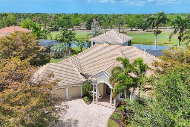 7011 Portmarnock Place LAKEWOOD RANCH, FL House Active - Photo 1 of 95. Opens carousel modal