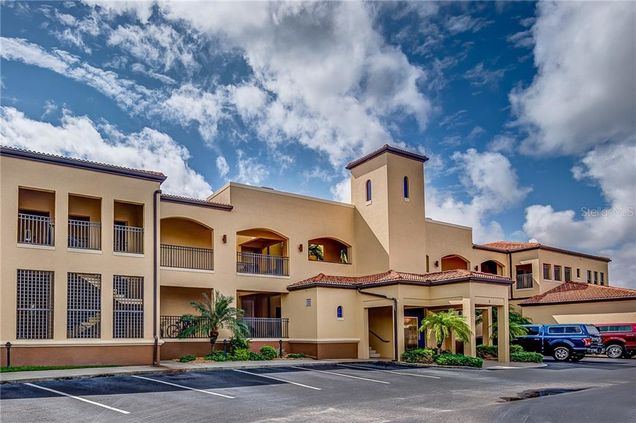 3334 Purple Martin Drive Unit 212 PUNTA GORDA, FL Condo Active - Photo 1 of 46. Opens carousel modal
