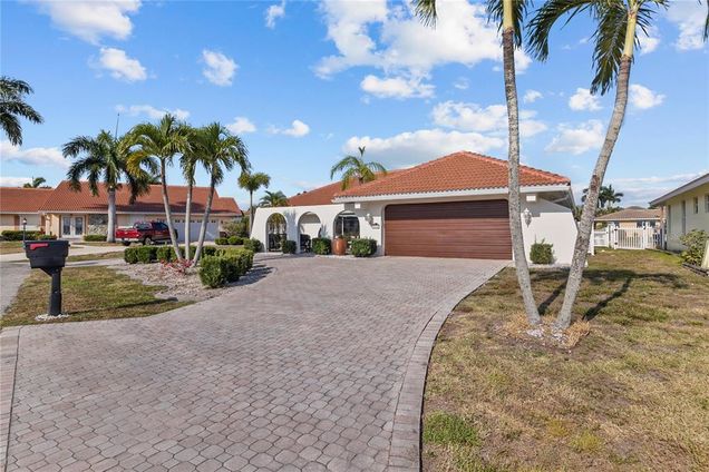 918 Messina Drive PUNTA GORDA, FL House Active - Photo 1 of 52. Opens carousel modal