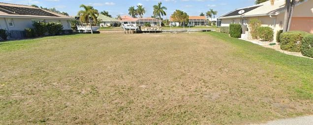 1114 Lucia Drive PUNTA GORDA, FL Plot of land Active - Photo 1 of 13. Opens carousel modal