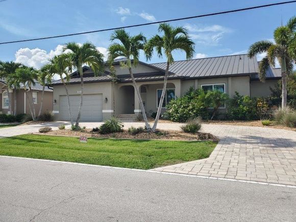 2100 Aqui Esta Drive PUNTA GORDA, FL House Active - Photo 1 of 28. Opens carousel modal