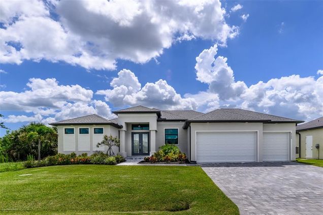 9445 Galaxie Circle PORT CHARLOTTE, FL House Active - Photo 1 of 45. Opens carousel modal