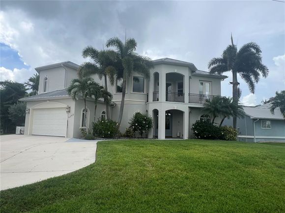 4245 Spire Street PORT CHARLOTTE, FL House Active - Photo 1 of 98. Opens carousel modal