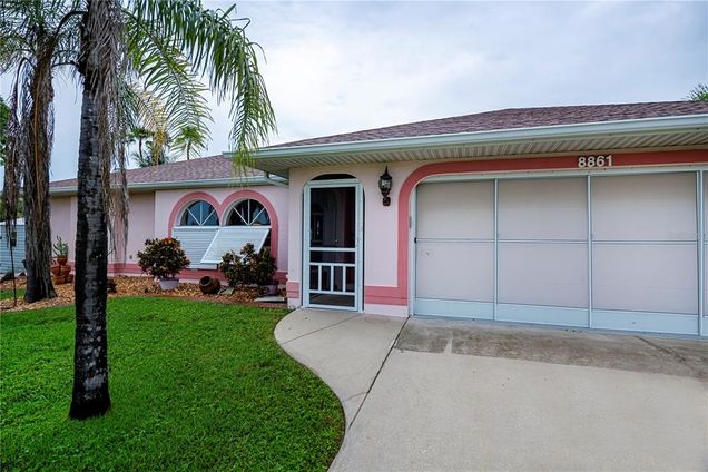 8861 Calumet Boulevard PORT CHARLOTTE, FL House Active - Photo 1 of 55. Opens carousel modal
