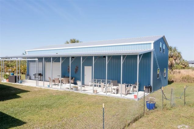 7042 Austrian Boulevard PUNTA GORDA, FL Plot of land Active - Photo 1 of 16. Opens carousel modal